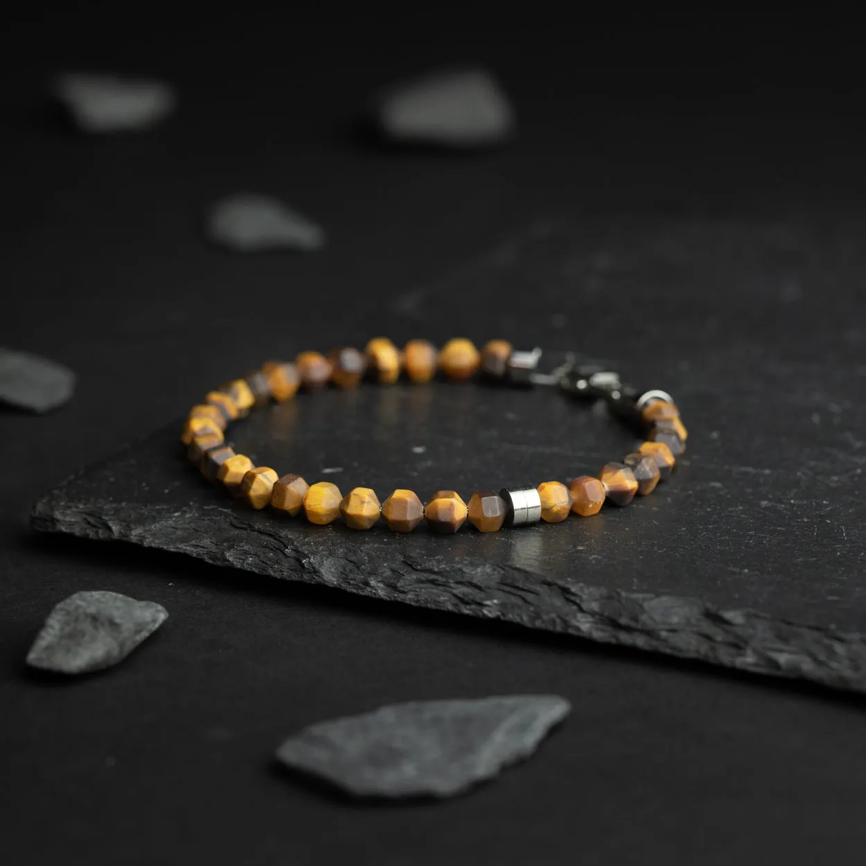 Bracelet with 6mm matte Tiger Eye stone and titanium element