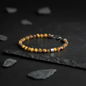 Bracelet with 6mm matte Tiger Eye stone and titanium element